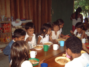 school children have a meal at xixuau